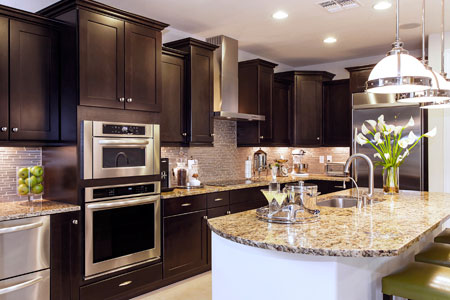 Black granite with cherry cabinets